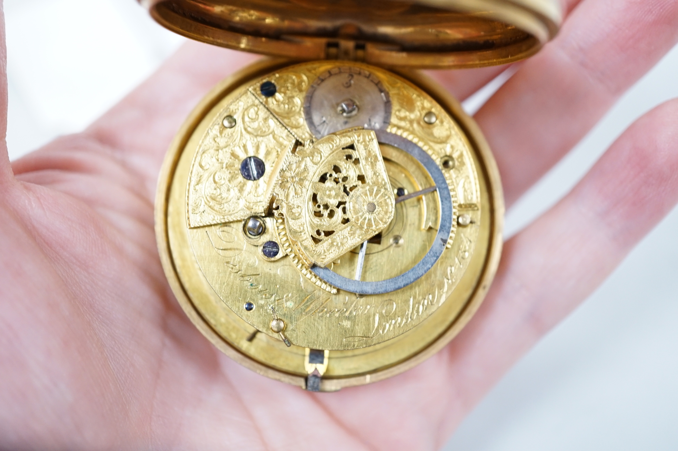 A George III pair gilt metal and polychrome enamel pair cased keywind verge pocket watch by Dubois & Wheeler of London, case diameter 56mm.